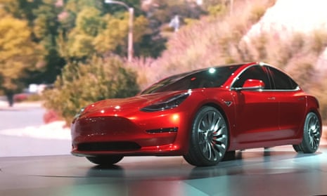 A Tesla Model 3 sedan, its first car aimed at the mass market, is displayed during its launch in Hawthorne, California.
