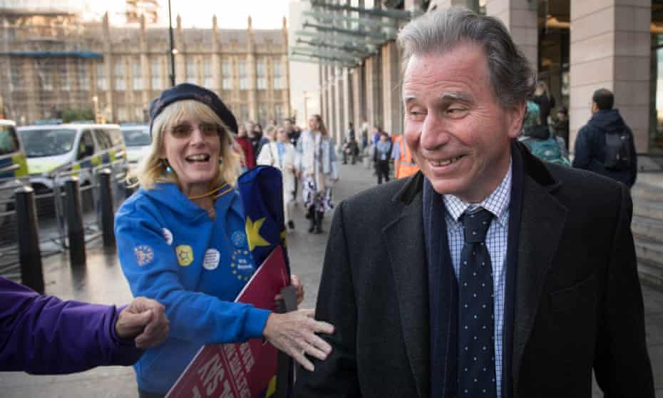 Oliver Letwin is congratulated by anti-Brexit activists in Parliament Square, London, after his amendment was passed in the Commons.