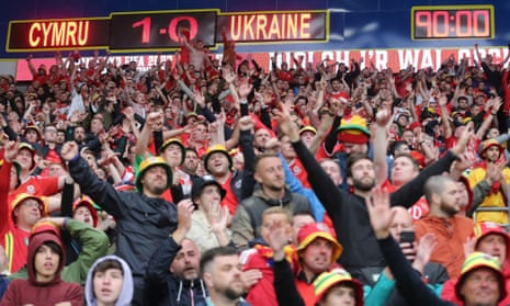 The scoreboard reads Cymru 1-0 Ukraine in Cardiff after Wales booked their World Cup place.