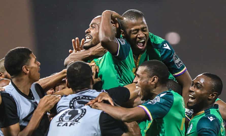 Comoros’ forward Ahmed Mogni (centre) celebrates with teammates after scoring his team’s second goal against Ghana.