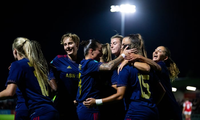 Romee Leuchteris congratulates after scoring a goal.