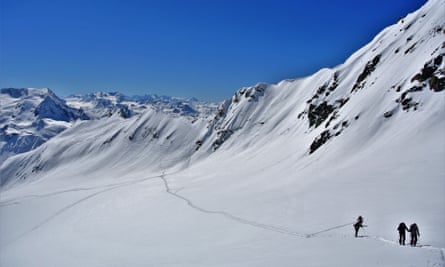 Group in a wide snowy valley