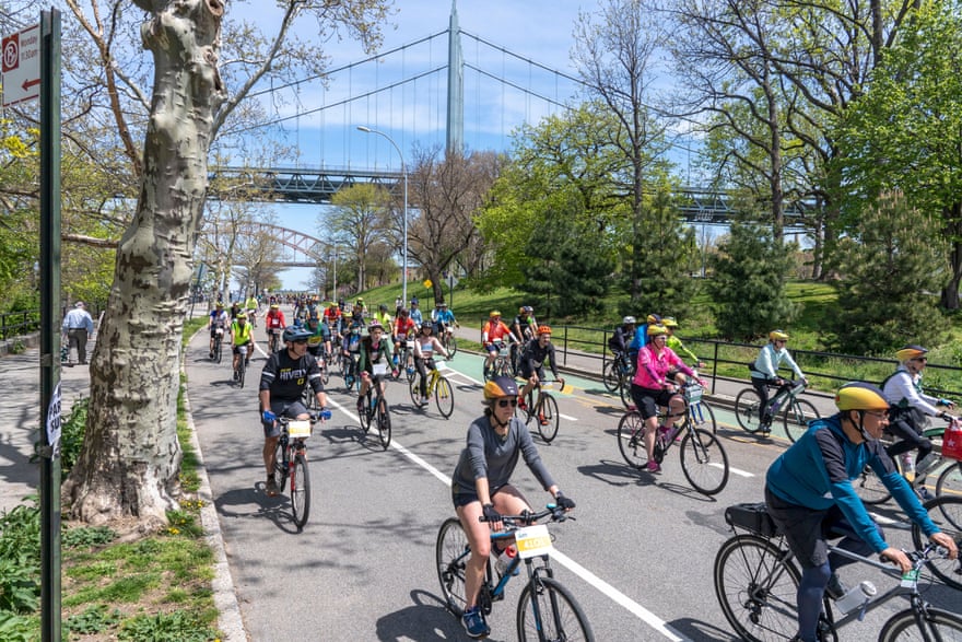 Thousands of cyclists of all skill levels ride 40 miles through every borough of New York City on streets totally free of cars during the annual five-borough bike tour on 1 May.