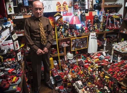 Surrounded by clutter … Metinides at home in his modest Mexico City apartment.