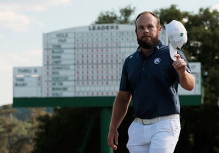 Tyrrell Hatton waves his headdress connected nan 18th spread aft finishing his last information