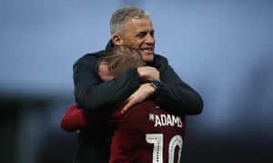 Keith Curle and Nicky Adams celebrate the third round of Northampton at Derby.