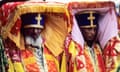 Ethiopian priests at  religious festival carrying covered tabots on their heads