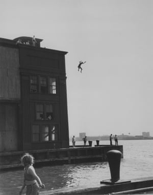 Boy jumping into Hudson River, NYC, 1948  After Orkin moved to New York, she worked as a nightclub photographer by night and shot baby pictures by day, while saving for her first professional camera