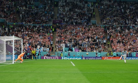 Lionel Messi blasts his unstoppable penalty past Dominik Livakovic to open the scoring.