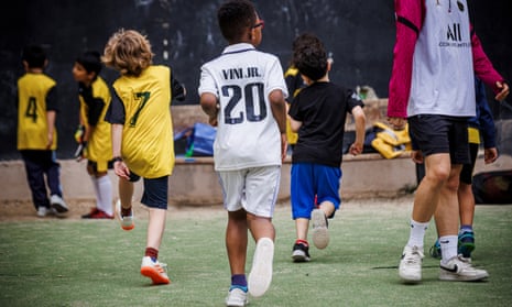 Youngsters from the Dragones de Lavapiés train in Madrid.