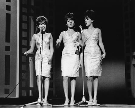 The Ronettes perform on stage in 1963.