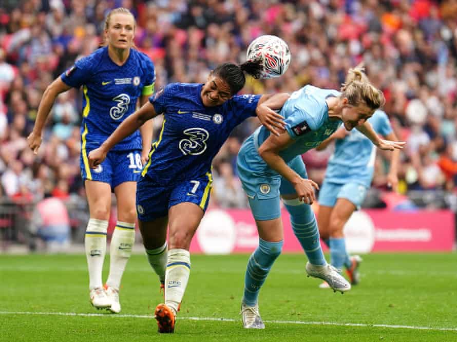 Chelsea’s Jessica Carter (left) gets the better of Manchester City’s Ellen White as they battle for the ball.