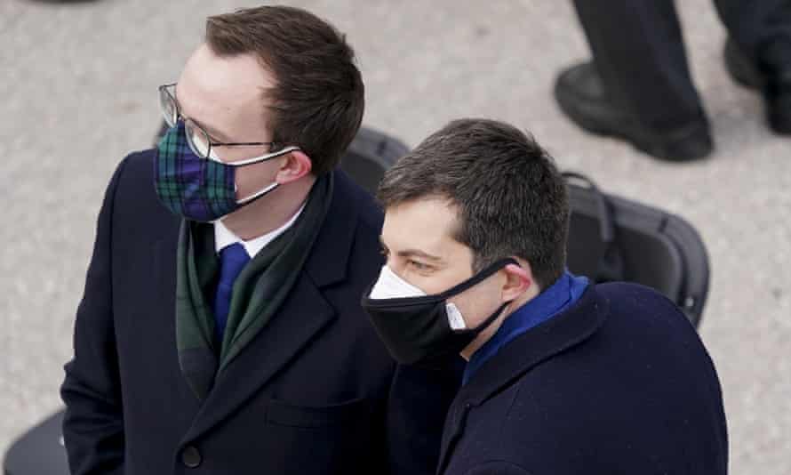 Pete Buttigieg, right, and his husband Chasten at the inauguration.