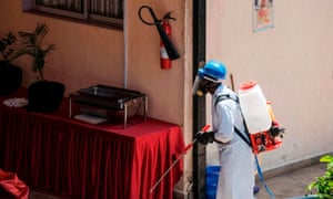 An employee of the Kenyan Ministry of Health fumigates a Government designated quarantine facility in Nairobi on 1 April 2020.