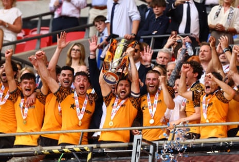 Hull lift the trophy after winning the Championship playoff final at Wembley