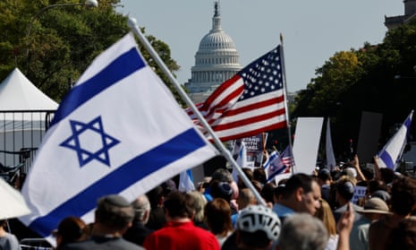 People gather for a 'Stand With Israel Rally' in Freedom Plaza on 13 October in Washington.