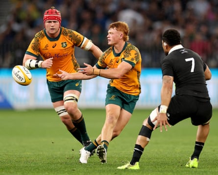 Tane Edmed passes the ball for the Wallabies