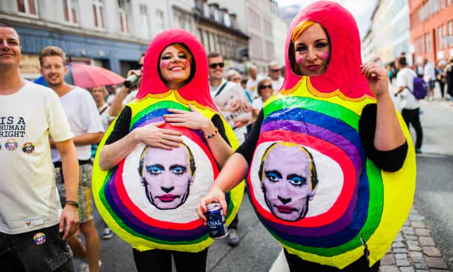 Gay pride marchers in Copenhagen wearing images of Russian president Vladimir Putin. 