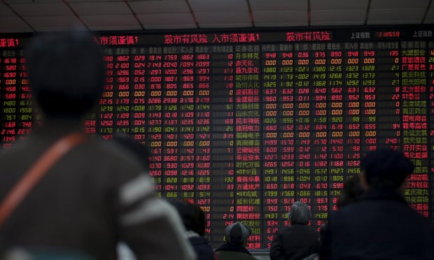 Stock information at a brokerage house in Shanghai: markets on Friday were volatile after Beijing ditched a circuit breaker that halted trading twice this week.