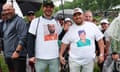 Fans wear shirts featuring Scottie Scheffler’s mugshot during the second round of the PGA Championship at Valhalla.