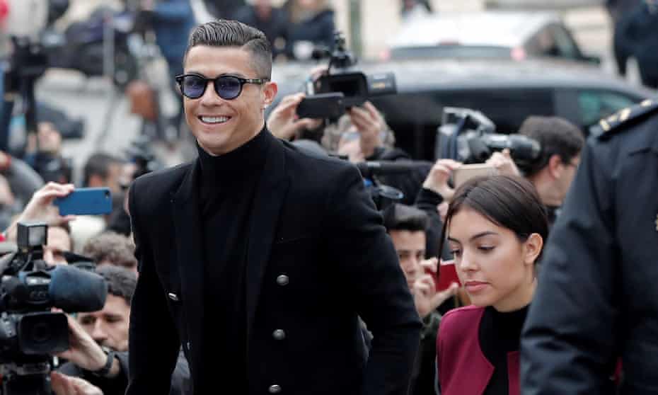Cristiano Ronaldo arrives at court in Madrid with his fiancée, Georgina Rodriguez