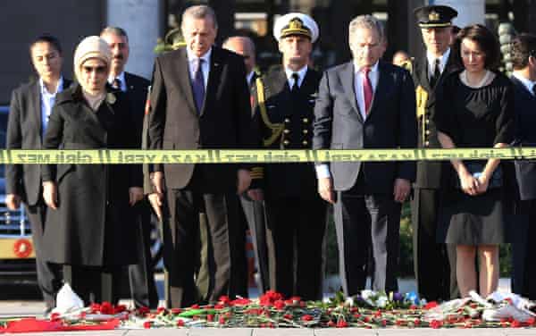 President Erdoğan (second left) at a wreath-laying ceremony at the site of the Ankara bombings.