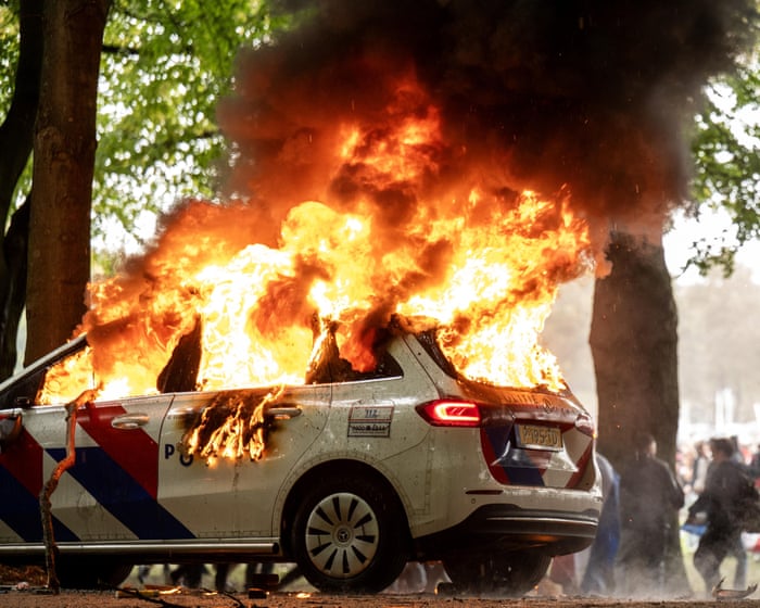 Police use water cannon at rightwing demonstration in the Netherlands – video