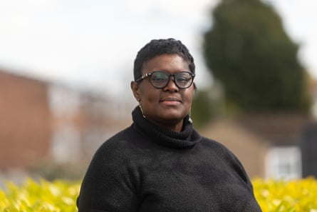 Chinasa Ezugha standing outside and looking at the camera.