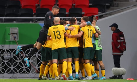 Australia players celebrate during the World Cup 2022 playoff against the United Arab Emirates.