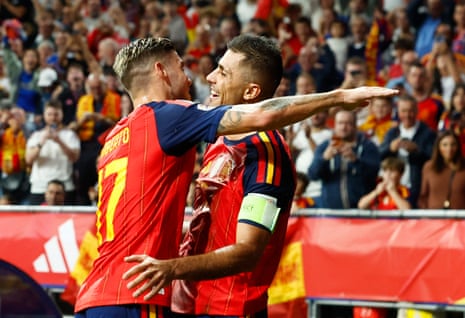 Rodri celebrates scoring.