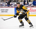 NHL’s Andrei Kuzmenko steps away from team after father killed in Siberia bear attack