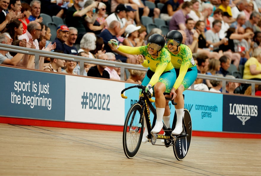 Jess Gallagher and Caitlin Ward celebrate winning track cycling gold.