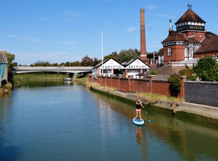 A paddle boarder on the River Ouse in Lewes.