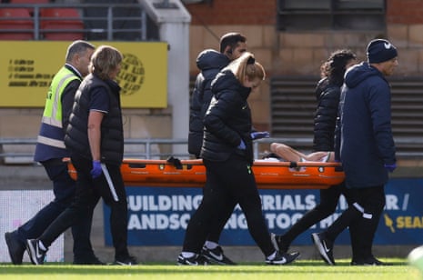 Tottenham Hotspur's Ellie Brazil is stretchered off after being injured at Brisbane Road.
