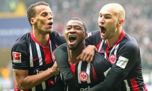 Eintracht Frankfurt’s Almamy Toure (centre) celebrates with teammate Timothy Chandler (left) and Bas Dost after scoring against RB Leipzig.