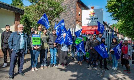 Teachers protest outside Starbank school in South Yardley, Birmingham, on Thursday. 