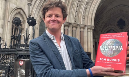 Tom Burgis outside the Royal Courts of Justice in London after a high court judge dismissed a libel claim against him over his book, Kleptopia: How Dirty Money is Conquering the World.