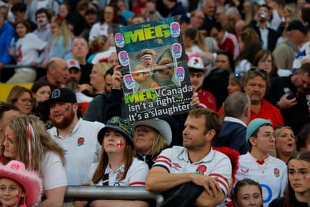 An England fan with a banner praising Meg Jones.