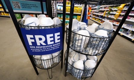 A product stall filled with free N95 respirator masks, provided by the Department of Health and Human Services, sits outside a pharmacyin Jackson, Mississippi.