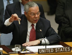 Powell holding up a vial that he said was the size that could be used to hold anthrax