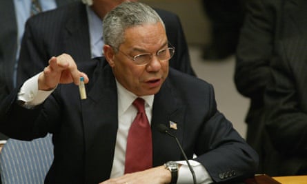 Colin Powell holds up a vial that could contain anthrax during his address to the UN security council, 5 February 2003.