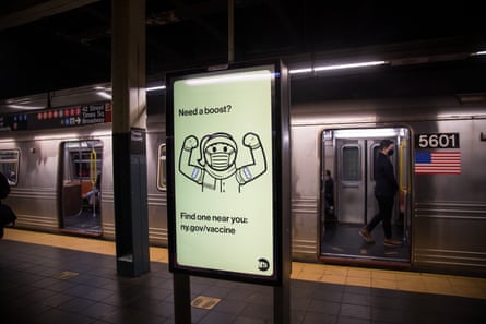 new york subway sign urges people to get booster shots