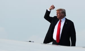 Trump boards Air Force One after his summit with Kim Jong-un.
