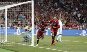 Sadio Mané wheels away to celebrate after making it 1-1.