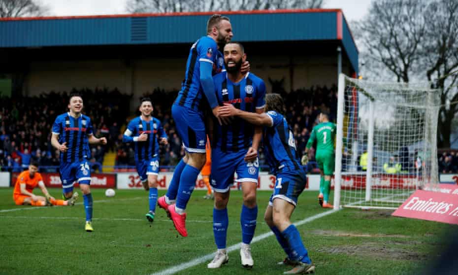 Aaron Wilbraham is congratulated after scoring Rochdale’s equaliser in their FA Cup third-round tie with Newcastle at Spotland