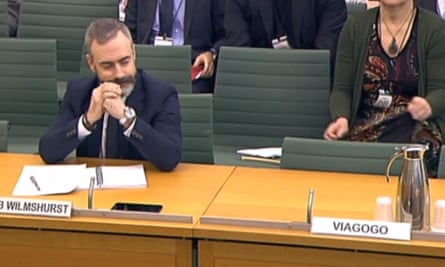 The empty seat of online ticketing site Viagogo (right) during a parliamentary hearing on ticketing abuse by the Culture, Media and Sport Committee in the House of Commons, London.