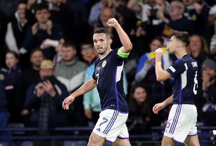 Scotland's John McGinn celebrates after opening the scoring.