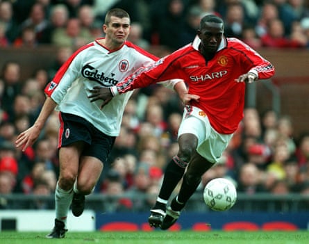 Dwight Yorke fends off Dominic Matteo in Manchester UnitedâÂÂs FA Cup fourth-round win against Liverpool in January 1999