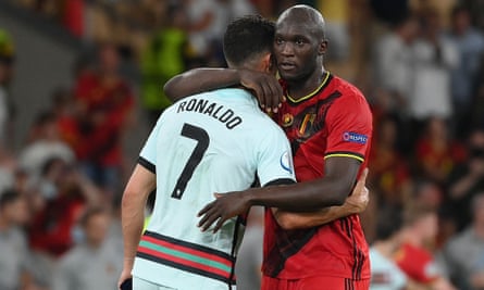 Cristiano Ronaldo and Romelu Lukaku embrace after the final whistle in Seville.