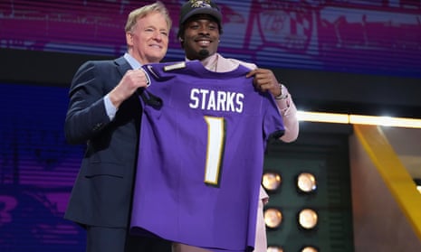 Georgia defensive back Malaki Starks, right, poses with NFL commissioner Roger Goodell.
